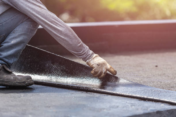 Professional Waterproofing technician working in Manchester, NY